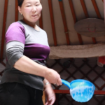 Dalaimyagmar transfers boiled milk